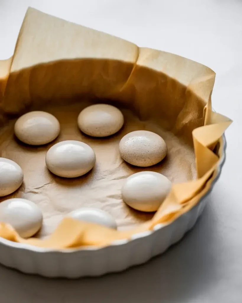 Blind baking with pie weights creates a crispy, non-soggy bottom crust