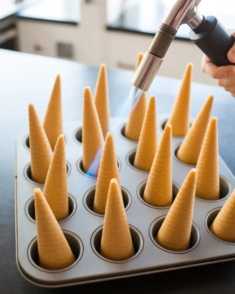 Sugar cones toasted and ready in muffin tin to prevent soggy bottoms