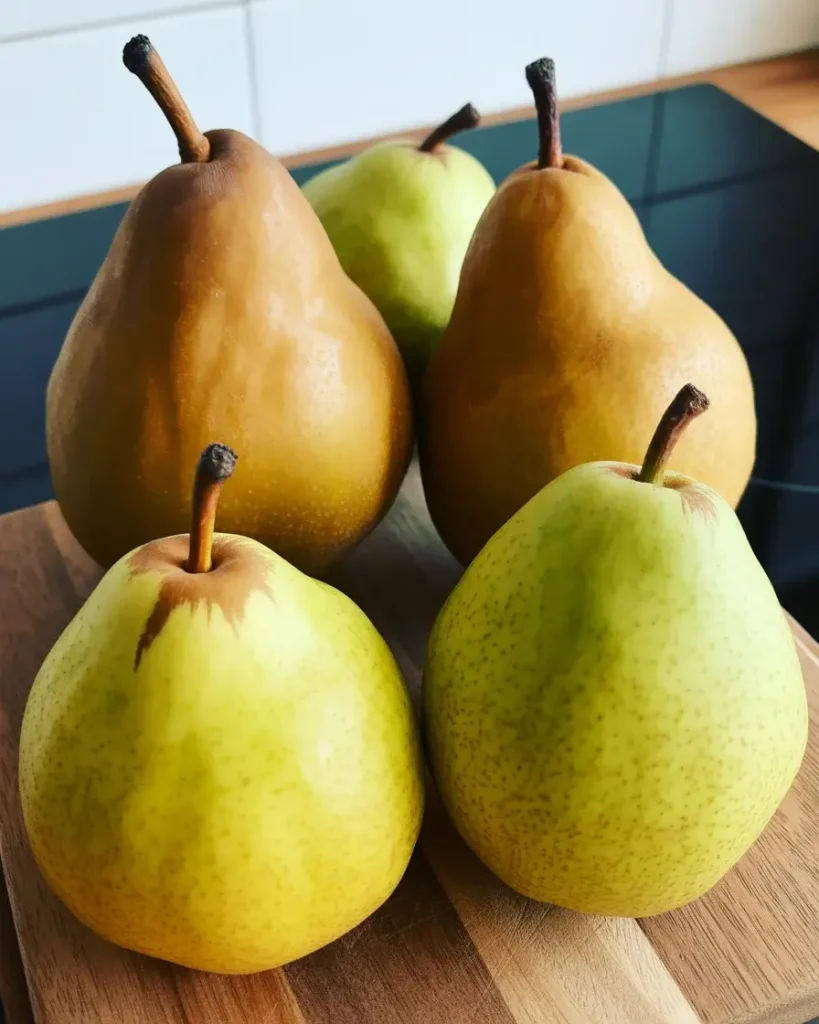 Bosc vs Anjou pears - both work, but Bosc holds its shape better when poached
