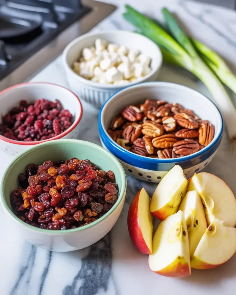 All prepped salad ingredients in small bowls ready to combine